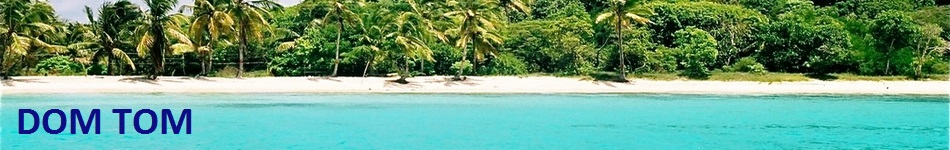 The region consists of the Antilles, divided into the larger Greater Antilles which bound the sea on the north, the Lesser Antilles on the south and east (including the Leeward Antilles), the Bahamas, and the Turks and Caicos Islands or the Lucayan Archipelago, which are in fact in the Atlantic Ocean north of Cuba, not in the Caribbean Sea. Some islands in the region have relatively flat terrain of non-volcanic origin. These islands include Aruba (possessing only minor volcanic features), Barbados, Bonaire, the Cayman Islands, Saint Croix, The Bahamas or Antigua. Others possess rugged towering mountain-ranges like the islands of Cuba, Hispaniola, Puerto Rico, Jamaica, Dominica, Montserrat, Saba, Saint Kitts, Saint Lucia, Saint Thomas, Saint John, Tortola, Grenada, Saint Vincent, Guadeloupe, Martinique, and Trinidad & Tobago. The climate of the region is tropical but rainfall varies with elevation, size and water currents (cool upwellings keep the ABC islands arid). Warm, moist tradewinds blow consistently from the east creating rainforest/semidesert divisions on mountainous islands. Occasional northwesterlies affect the northern islands in the winter. The region enjoys year-round sunshine, divided into 'dry' and 'wet' seasons, with the last six months of the year being wetter than the first half. The waters of the Caribbean Sea host large, migratory schools of fish, turtles, and coral reef formations. Hurricanes, which at times batter the region, usually strike northwards of Grenada, and to the west of Barbados. The principal hurricane belt arcs to northwest of the island of Barbados in the Eastern Caribbean. The region sits in the line of several major shipping routes with the man-made Panama Canal connecting the western Caribbean Sea with the Pacific Ocean.